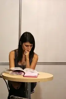 Woman sitting and reading