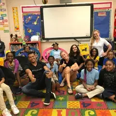 Group photo the the Bethune - Bowman Elementary School with kids sitting on the floor.