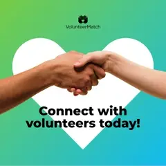shaking hands in front of a heart