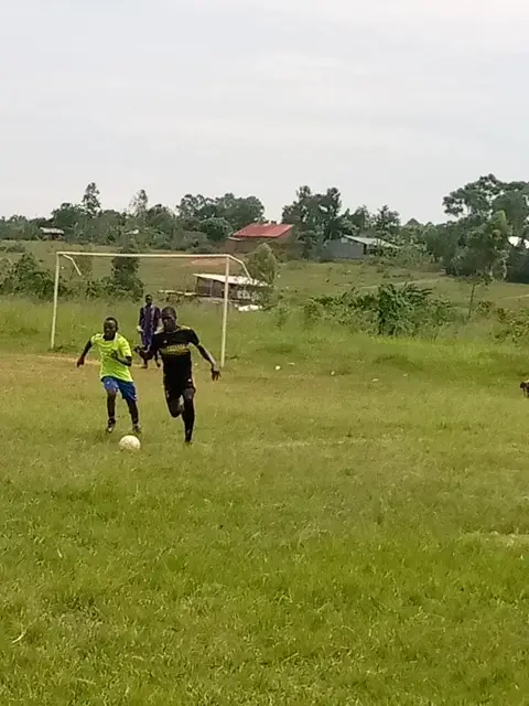 Soccer coaching at an Orphanage school in Uganda