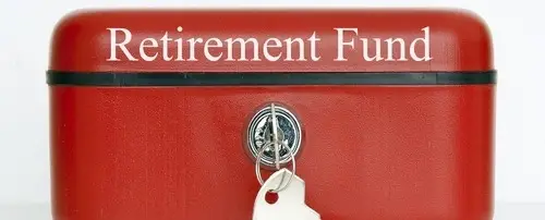 A red case with a key in it. It says 'Retirement Fund' at the top.