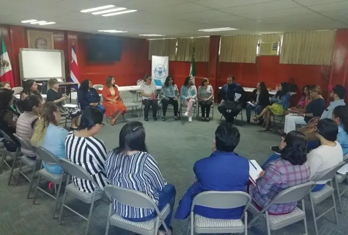 Group of people sitting in a circle