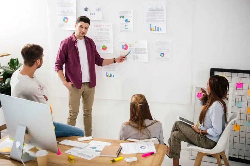 CSR professionals at work in a busy office
