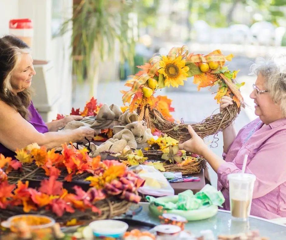 Lead older adults in craft activities (varies)