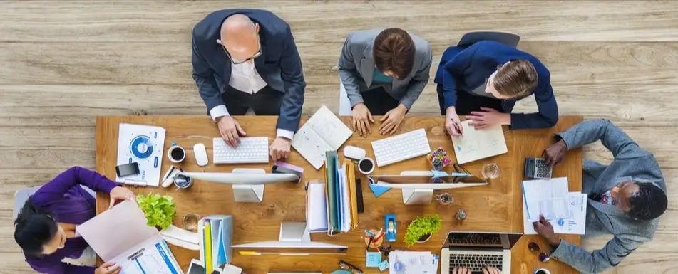 An overhead shot of a business meeting.