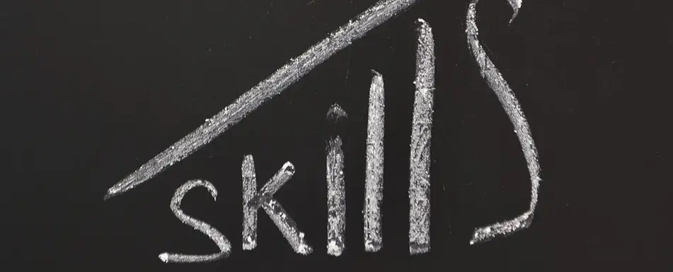 'Skills' written on a chalkboard.