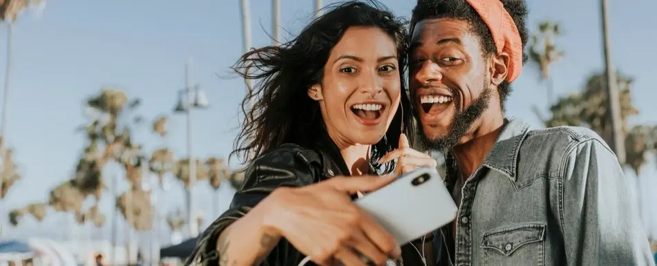 Two friends take a selfie.