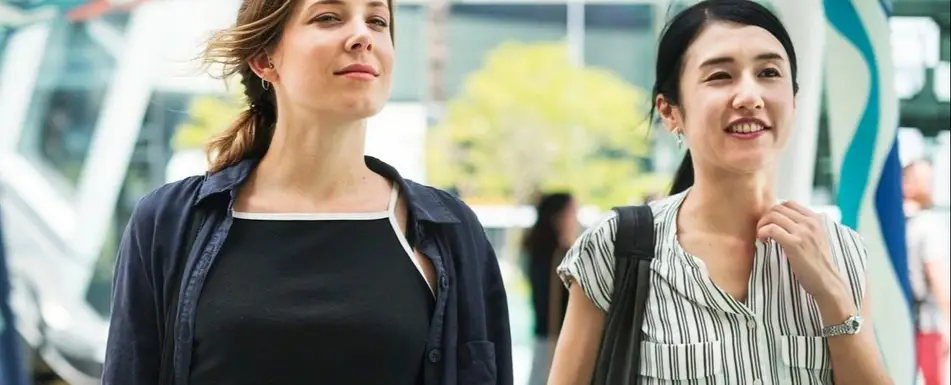 Two people walking.