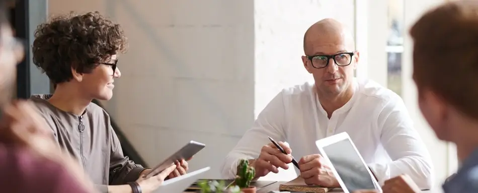 professionals sitting around a table