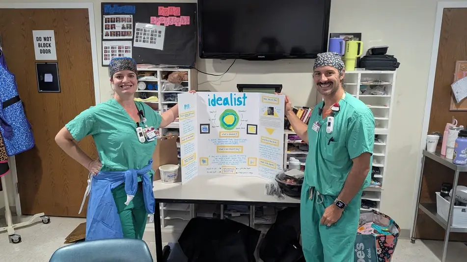 Megan P. and Nick talking about Idealist Days at work.