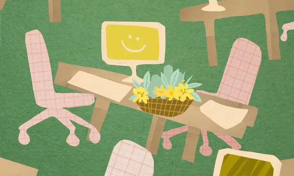 Office chairs and desks, with doodles of flowers and a smiley face on a computer.