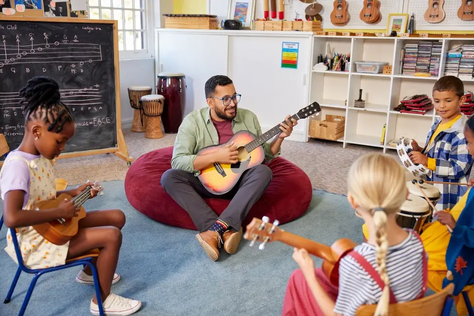 teacher leading music class