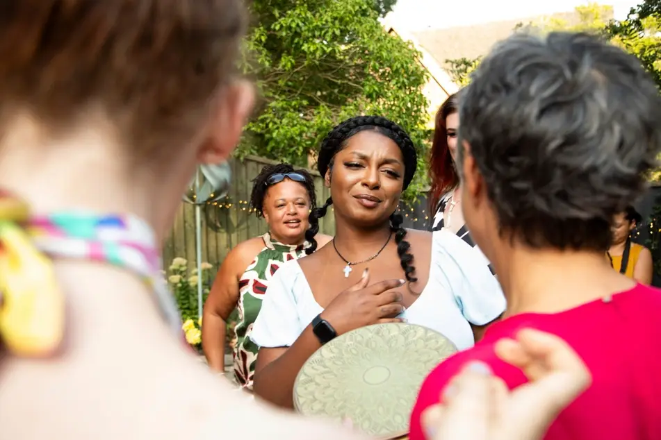 a community engagement professional attends an outreach event