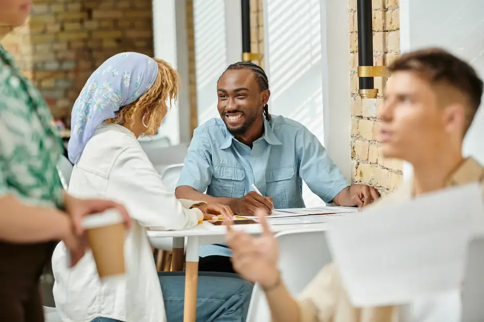 multicultural colleagues try to network at work