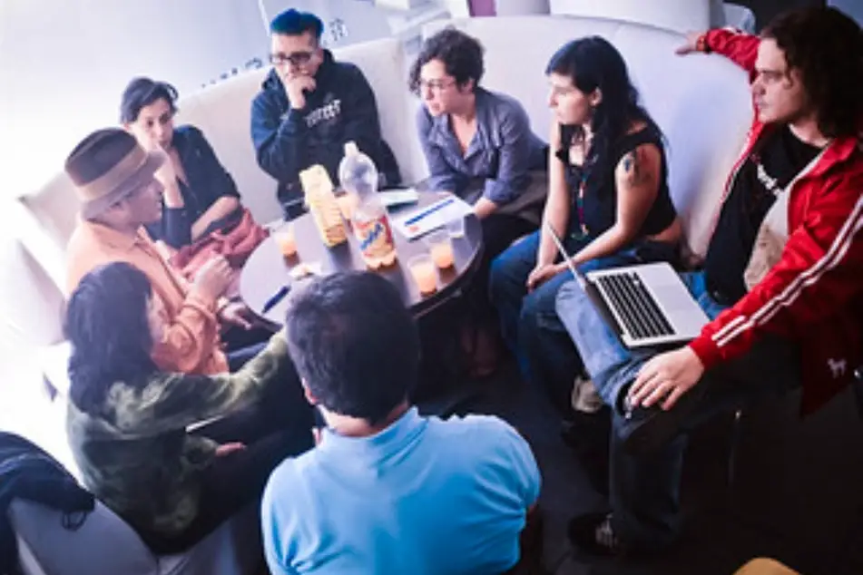 A brainstorm session around a table.