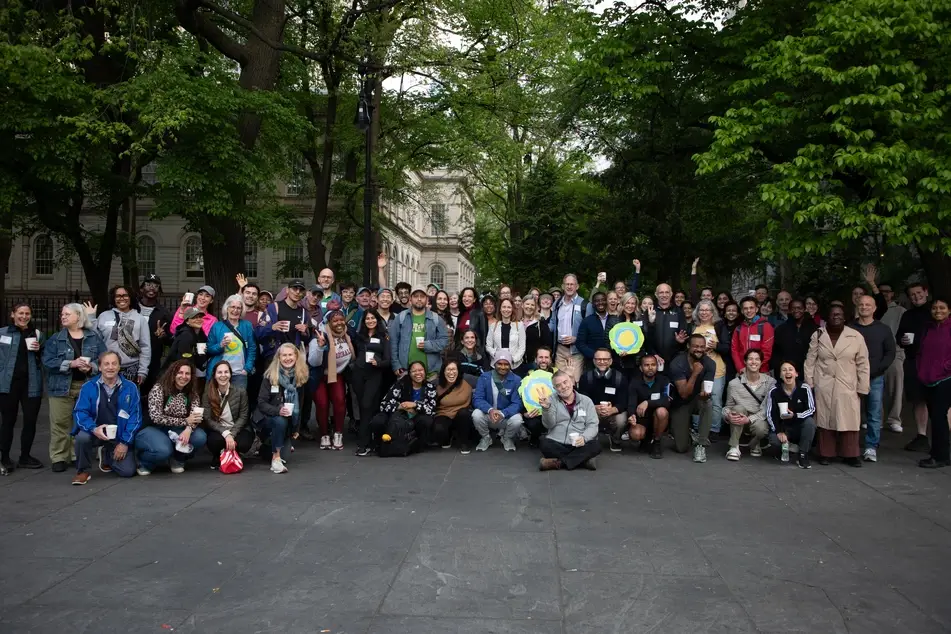 A group of people in New York walked the Brooklyn Bridge for Idealist Day 5/5.