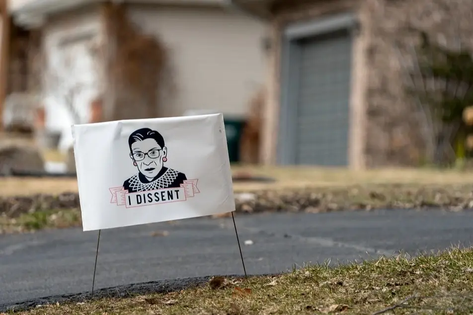 Ruth Bader Ginsburg illustration on a lawn sign