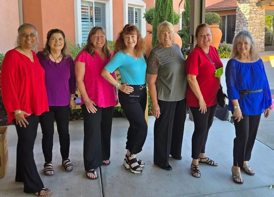 The Idealists of Roseville, CA group smiles for a photo on Idealist Days.