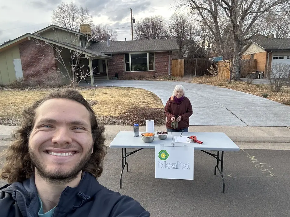 Jet P. from Colorado poses with his Idealist Day folding table.