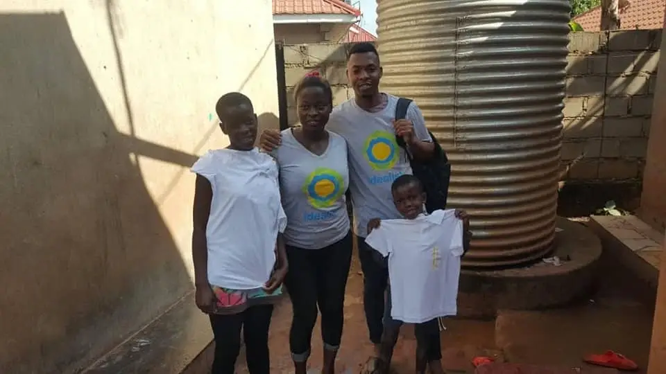 Group of people wearing idealist shirts.