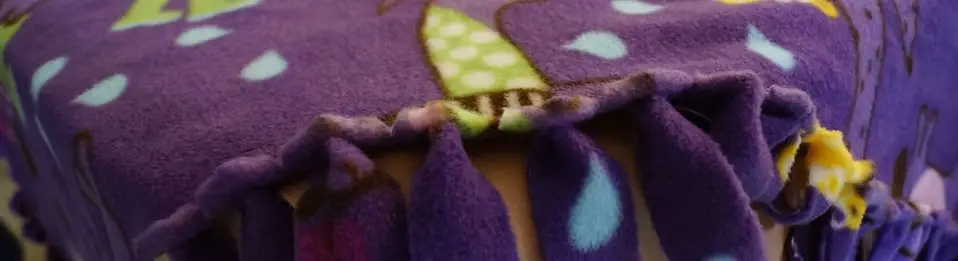Volunteer Child, and Teen Sized no-sew fleece blanket maker