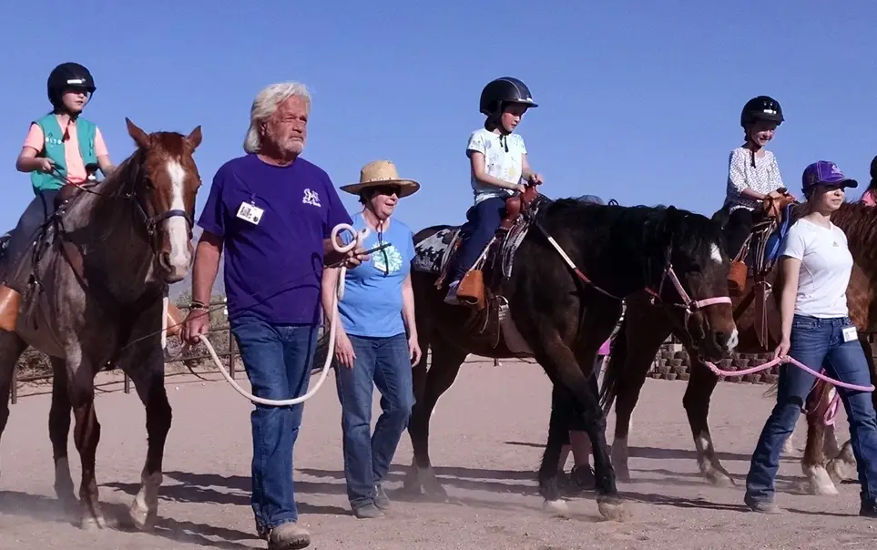 Horse Leader for therapeutic riding lessons