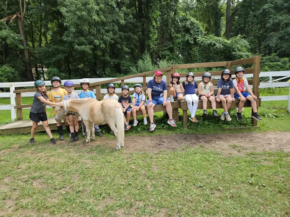 Summer Camp Counselor Volunteers help with camp activities, assist campers, and enjoy plenty of time around horses and farm animals while making a difference in a child's experience.