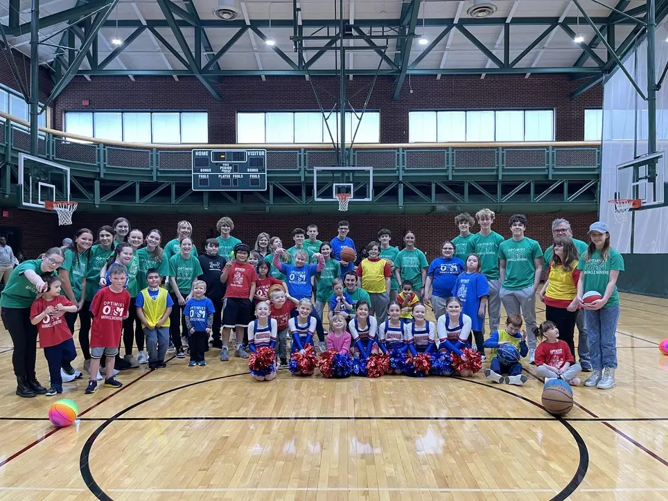 Buddy to athlete for Adaptive Youth Basketball Program