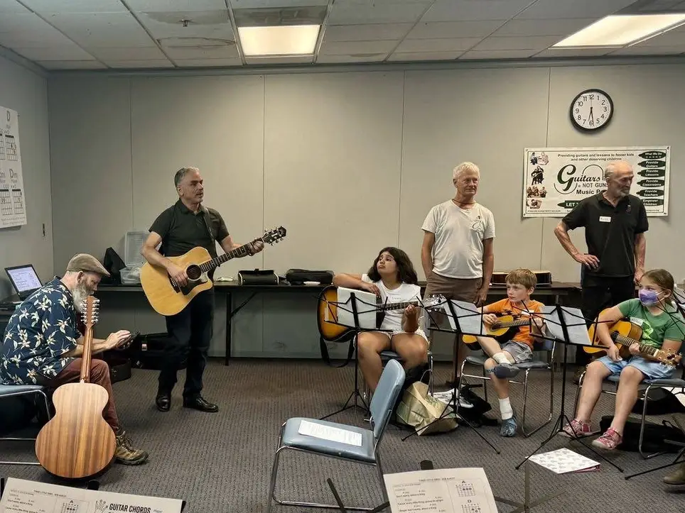 VOLUNTEER DIRECTOR/GUITAR INSTRUCTOR FOR YOUTH GUITAR CLASSES