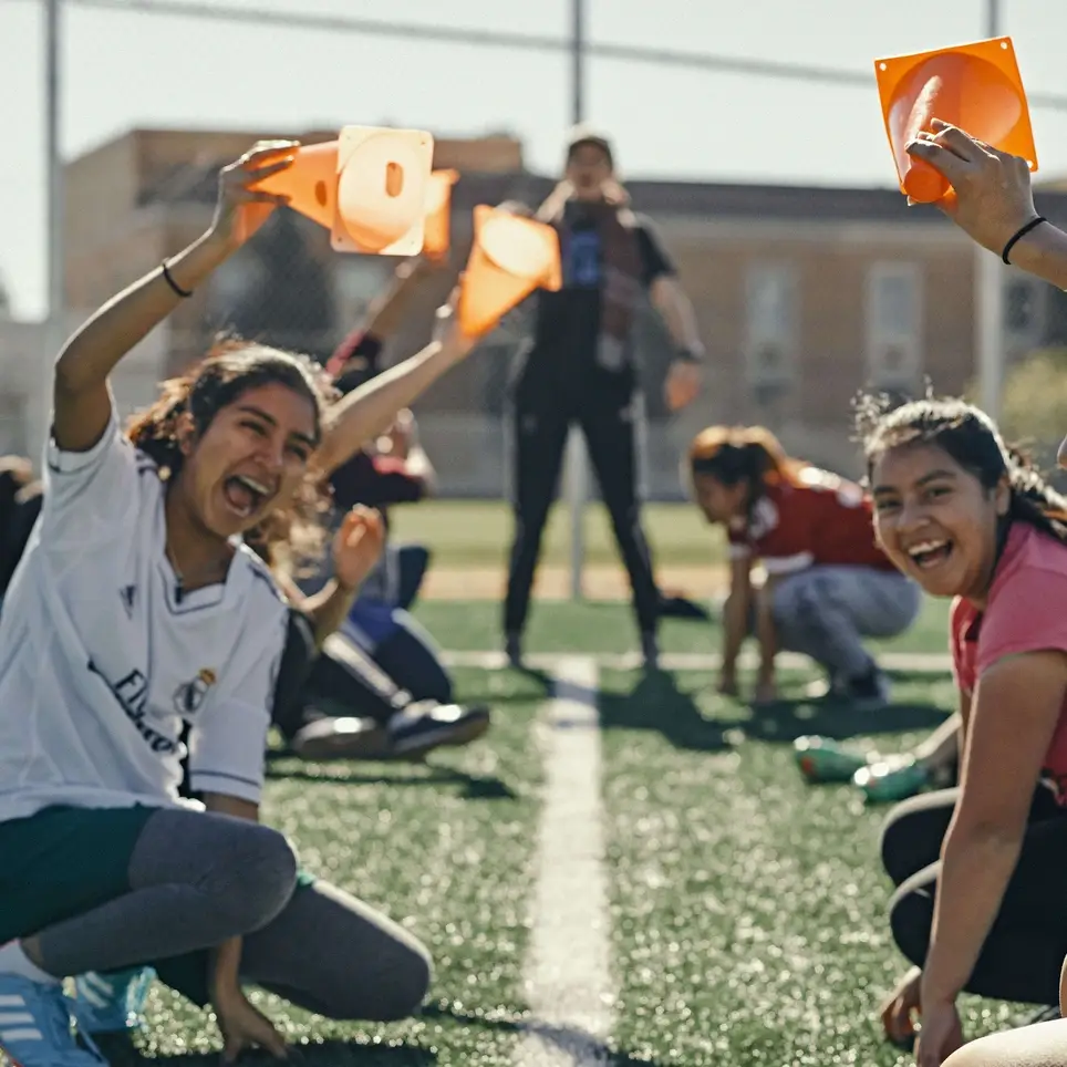 Support girls learning to play soccer as a Restorative Referee