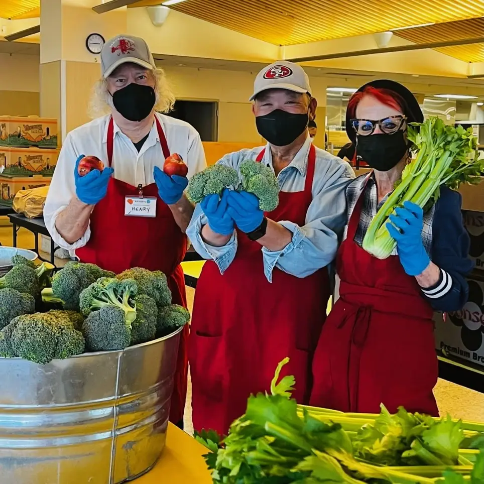 Distribute free and fresh produce at St. Anthony's Farmer's Market on Thursday Afternoon